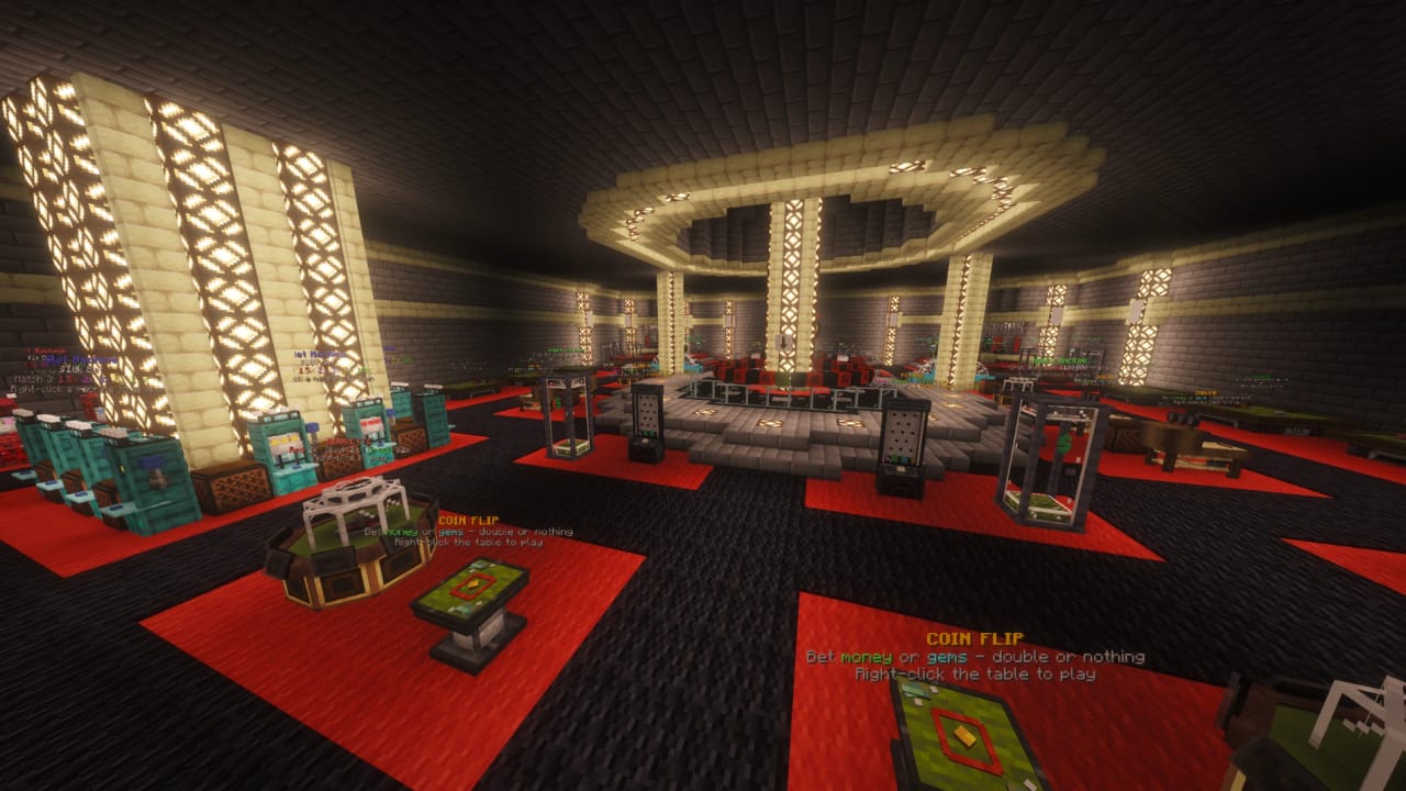 The SkyStakes Arcade hall, with slot machines, coin flip tables and a lit central stage